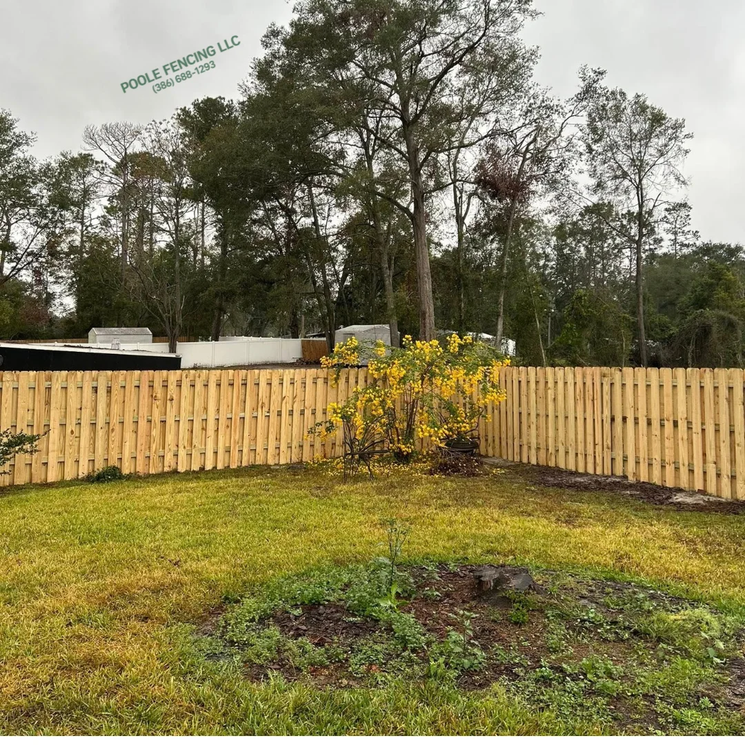 Wood privacy fence installation in North Florida